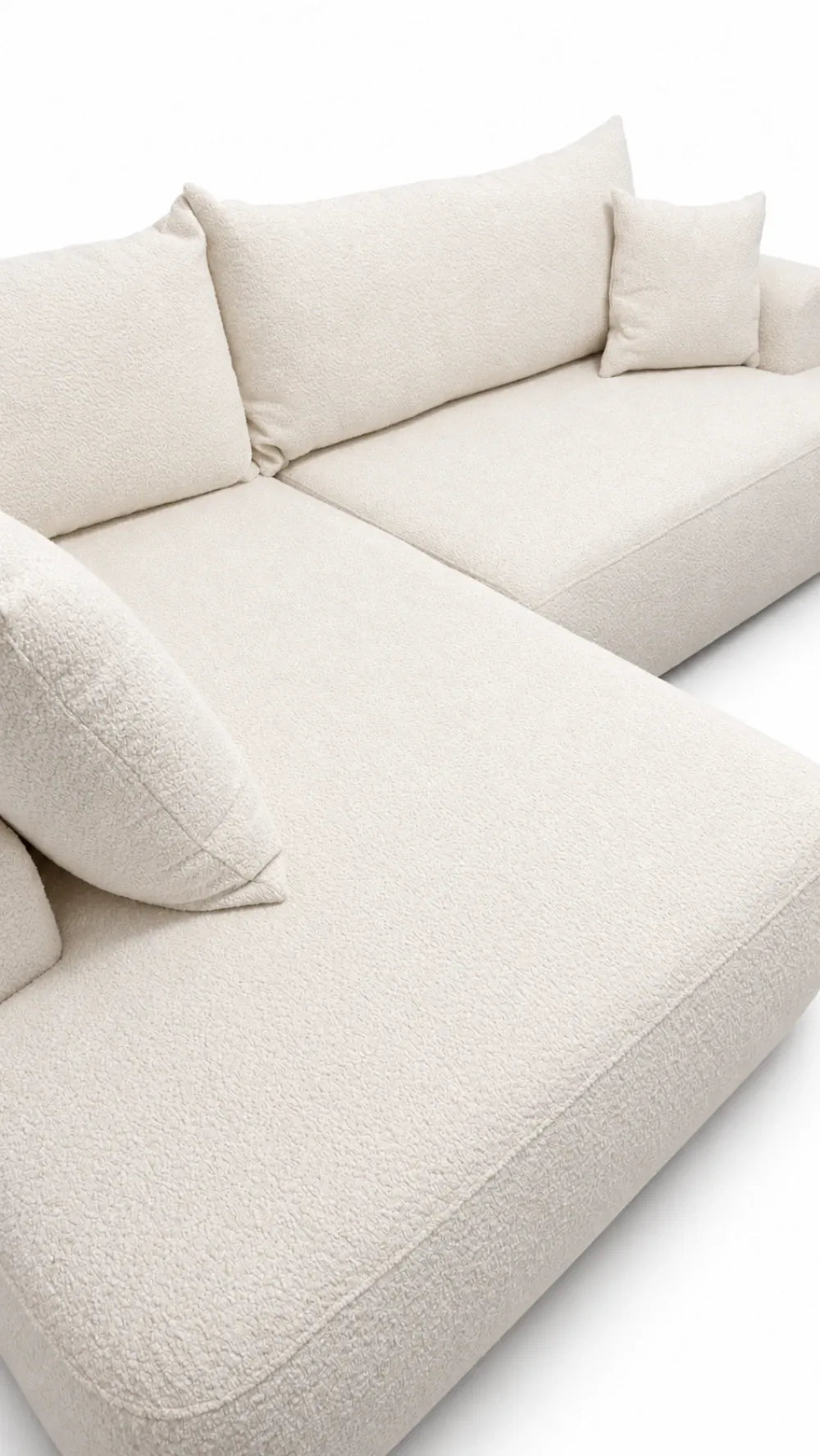 Coltar extensibil boucle alb cu lada depozitare Nubio L262x178cm