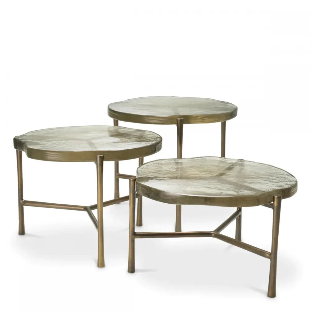 Set 3 masute de cafea Asimetrice din Aluminiu Alama si Sticla Transparent D62/64xH37/44/51.5cm Baldovini Eichholtz